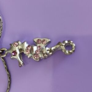Silver Seahorse Pendant with Pink Accents